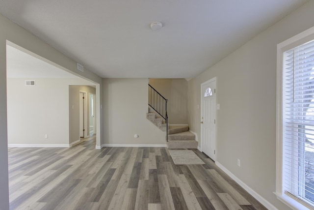 foyer with light wood-type flooring