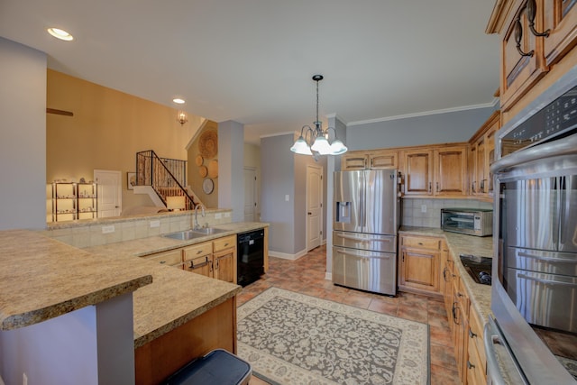 kitchen featuring sink, tasteful backsplash, hanging light fixtures, kitchen peninsula, and black appliances