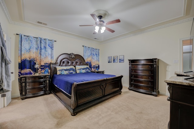 bedroom featuring ornamental molding, light carpet, and ceiling fan