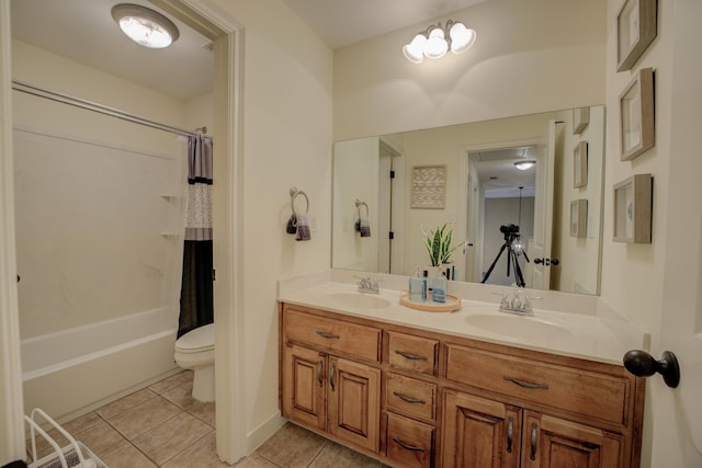 full bathroom with vanity, tile patterned flooring, toilet, and shower / bath combo with shower curtain