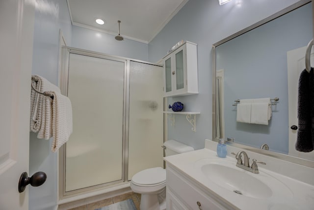 bathroom with toilet, a shower with shower door, ornamental molding, vanity, and tile patterned flooring