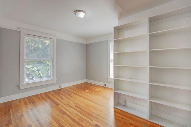 spare room featuring hardwood / wood-style flooring