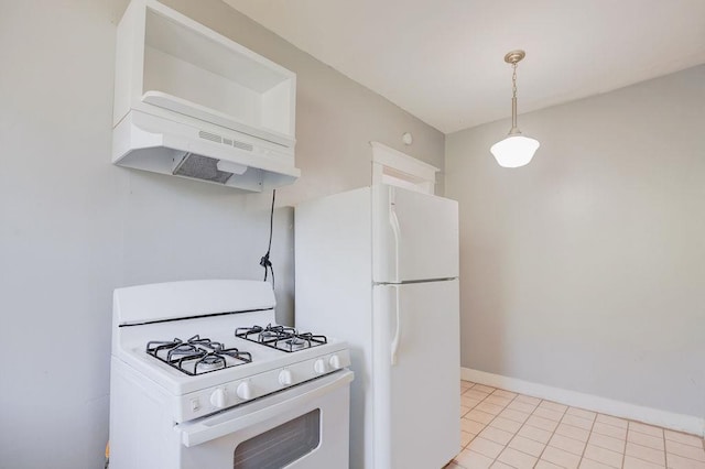 kitchen with wall chimney range hood, pendant lighting, light tile patterned floors, and white appliances