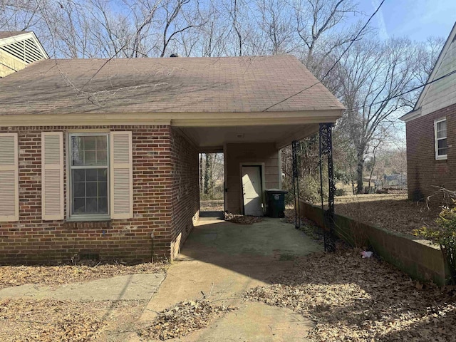 view of front of house featuring a carport