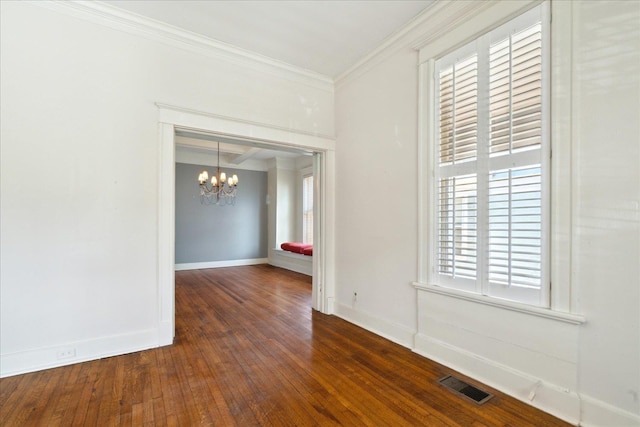 empty room with dark wood-type flooring, ornamental molding, and plenty of natural light