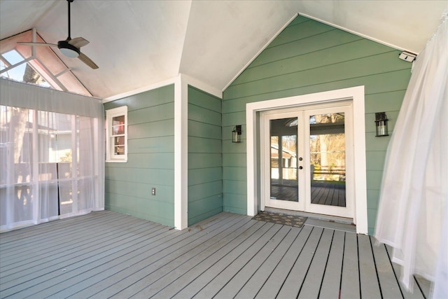 wooden terrace featuring french doors and ceiling fan