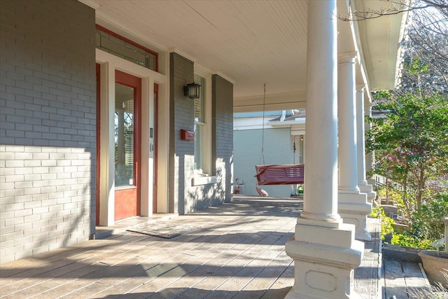 entrance to property with a porch