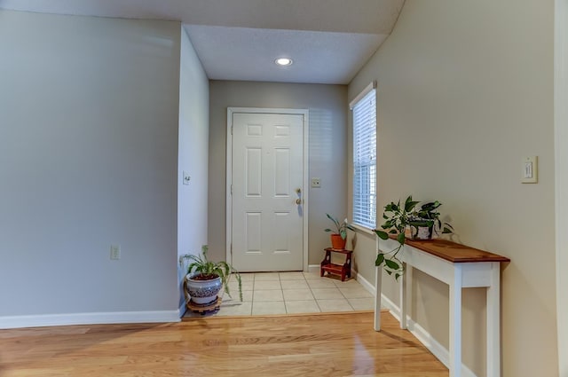 entrance foyer with light hardwood / wood-style flooring