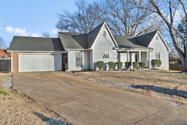 view of front of house with a porch and a garage