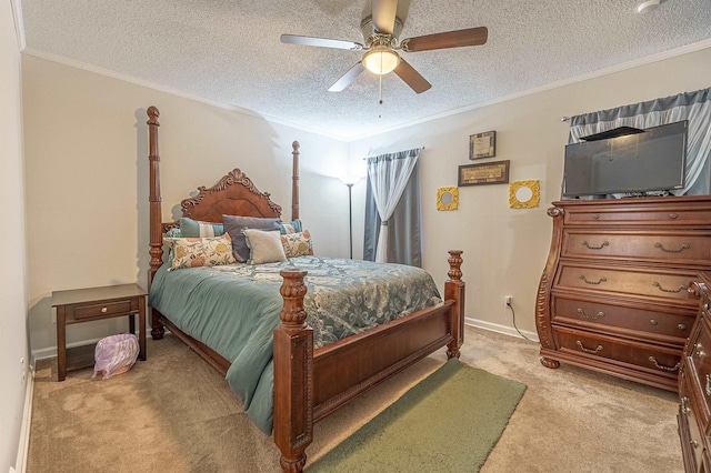 carpeted bedroom with crown molding, ceiling fan, and a textured ceiling