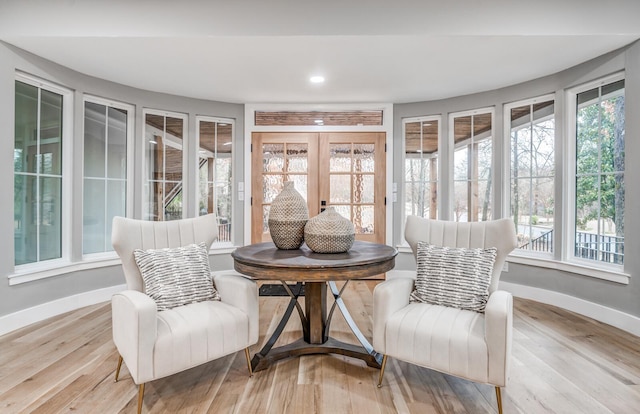 sunroom featuring a wealth of natural light