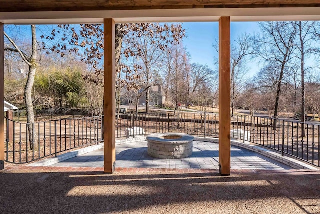 view of patio featuring a fire pit