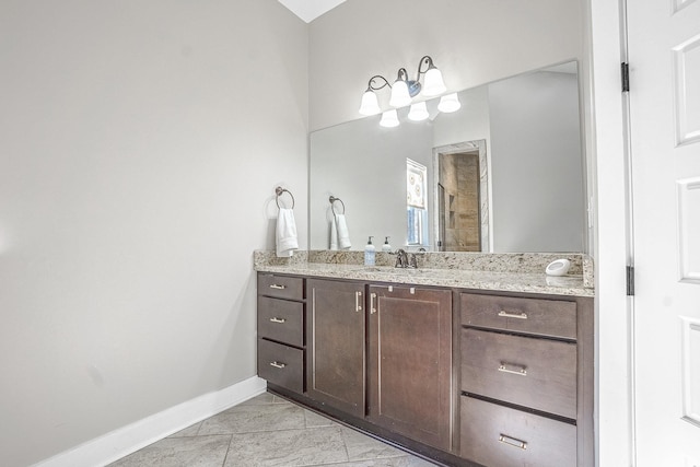 bathroom featuring vanity and tile patterned flooring