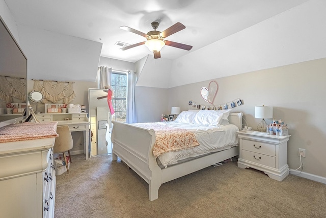 carpeted bedroom featuring vaulted ceiling and ceiling fan