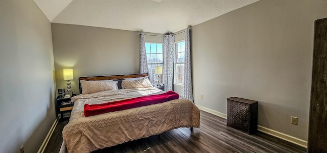 bedroom featuring dark hardwood / wood-style floors