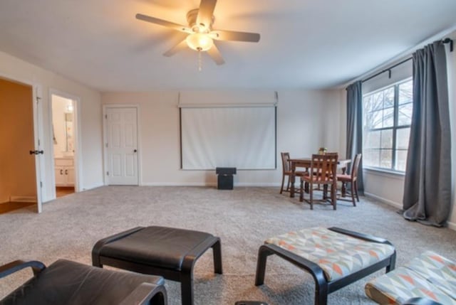 cinema with ceiling fan and carpet