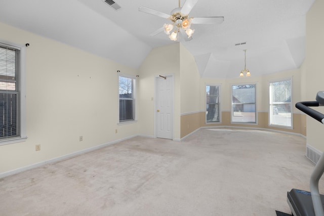 unfurnished living room with light carpet, lofted ceiling, and ceiling fan