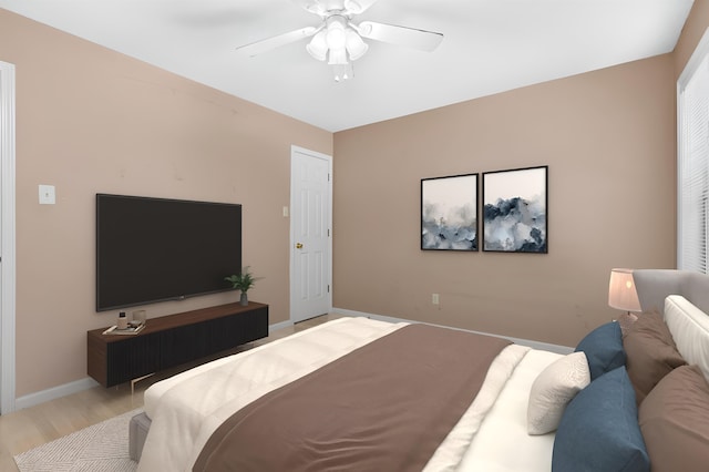 bedroom featuring light wood-type flooring, baseboards, and a ceiling fan