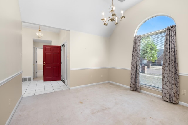 empty room featuring vaulted ceiling, light colored carpet, and a notable chandelier