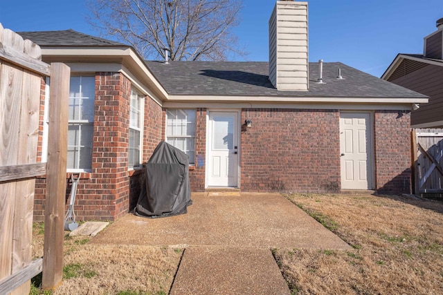 rear view of house with a patio