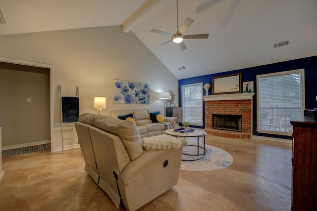 living room with plenty of natural light, beam ceiling, high vaulted ceiling, and a brick fireplace