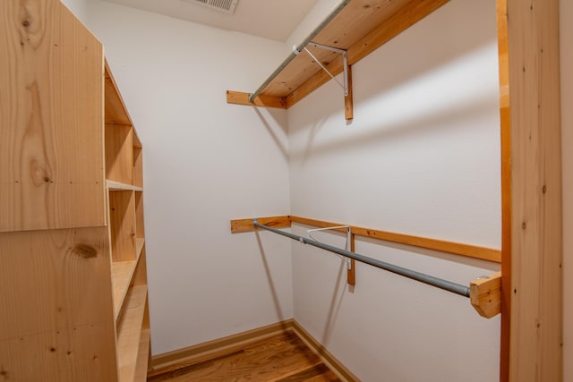 walk in closet featuring light wood-type flooring