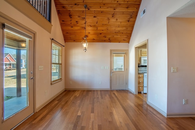 interior space featuring wood-type flooring, high vaulted ceiling, and wooden ceiling