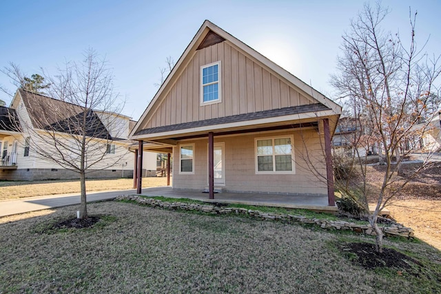 bungalow featuring a patio area and a front yard