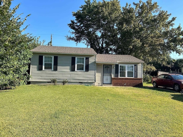 view of front of home with a front yard