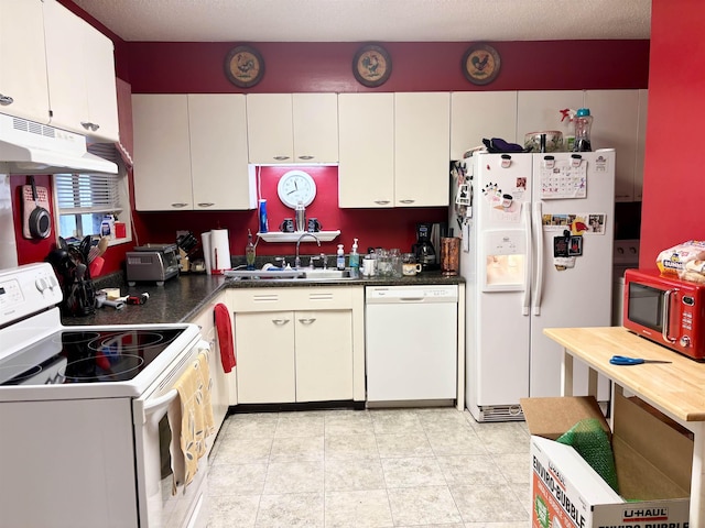 kitchen featuring white cabinetry, sink, white appliances, and light tile patterned floors