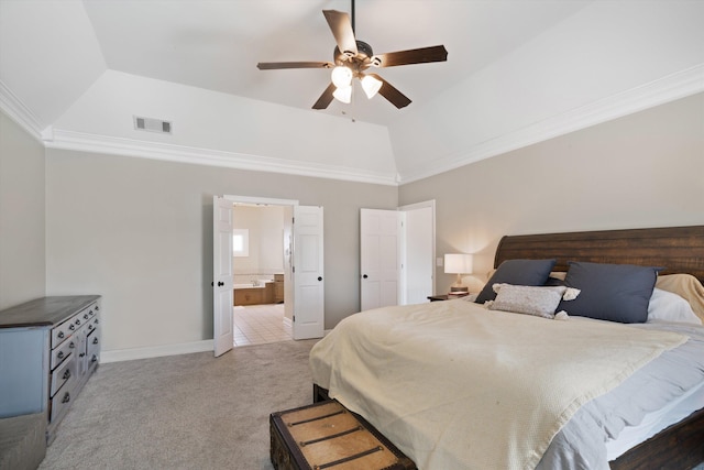 bedroom with ornamental molding, a raised ceiling, vaulted ceiling, and carpet