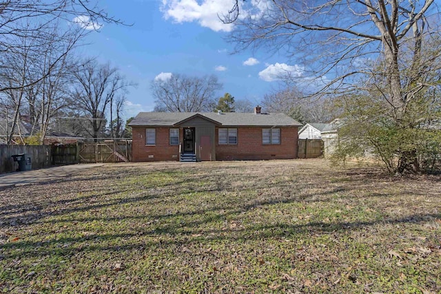 single story home with a front lawn