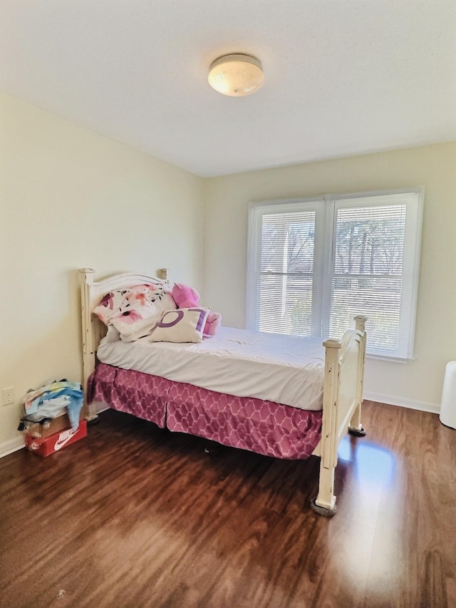 bedroom featuring hardwood / wood-style floors