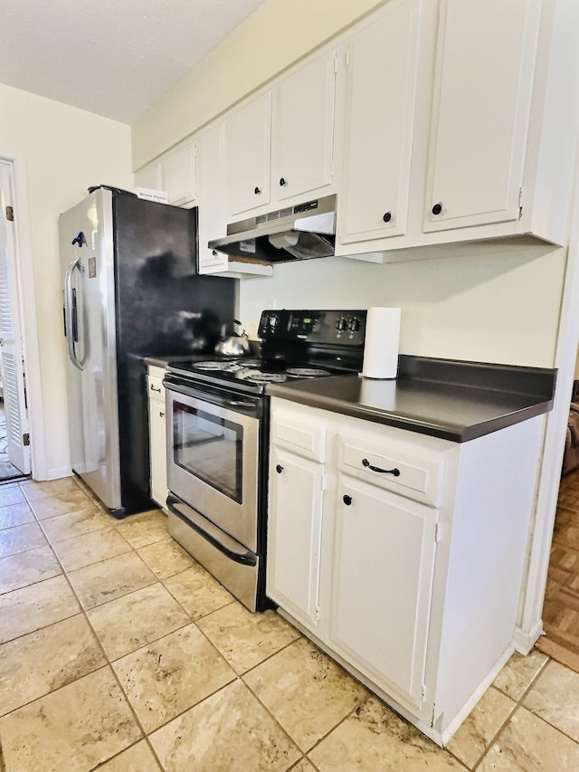 kitchen with white cabinetry, appliances with stainless steel finishes, and light tile patterned flooring