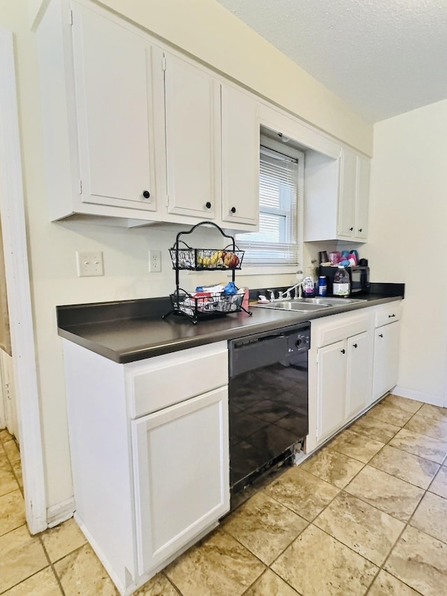 kitchen with white cabinetry, black dishwasher, sink, and a textured ceiling