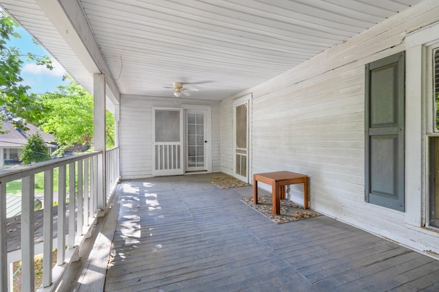 wooden deck with ceiling fan