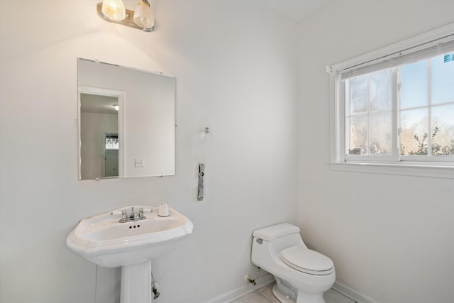 bathroom featuring sink and toilet