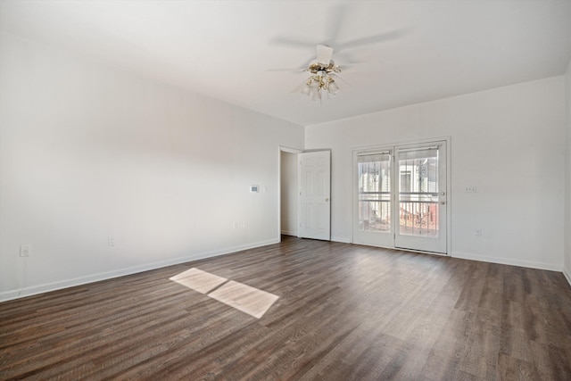 unfurnished room with dark wood-type flooring and ceiling fan