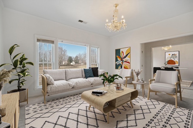 living room with crown molding, light colored carpet, and a chandelier