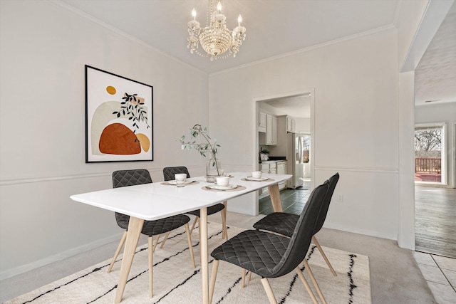 dining area with crown molding, light tile patterned flooring, and a chandelier