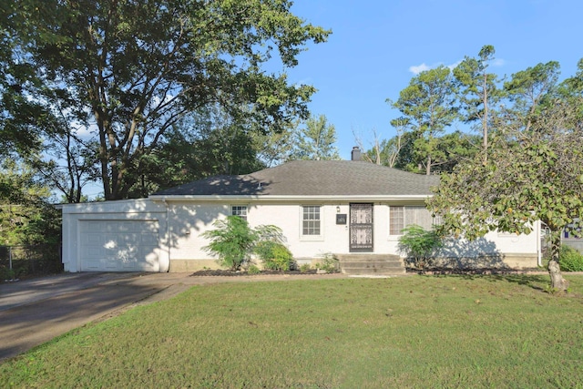 ranch-style house with a garage and a front yard