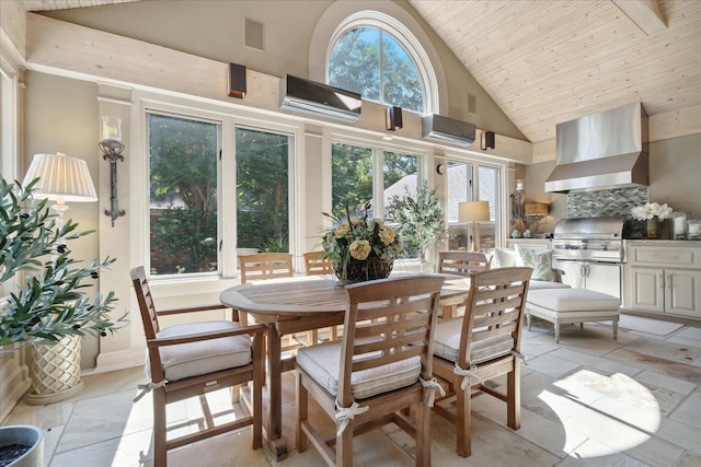 dining space with a wall unit AC, wooden ceiling, and high vaulted ceiling