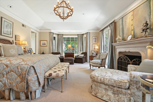 bedroom featuring an inviting chandelier, a tray ceiling, a fireplace, light carpet, and access to outside