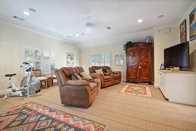 living room featuring lofted ceiling, crown molding, and ceiling fan