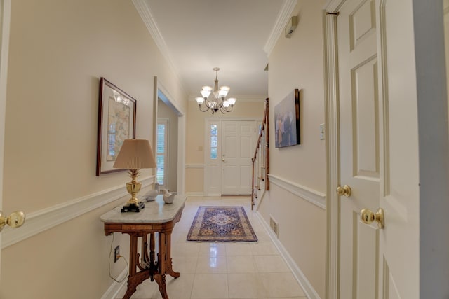 interior space with crown molding, light tile patterned flooring, and a notable chandelier