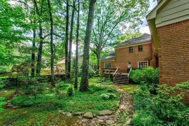 view of yard featuring a deck