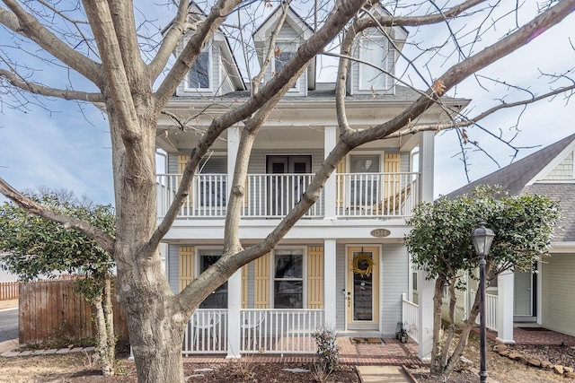 view of front of home with a balcony