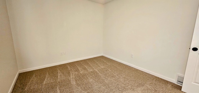 spare room with carpet flooring