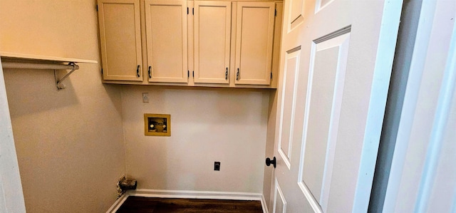 laundry room featuring cabinets, washer hookup, and electric dryer hookup