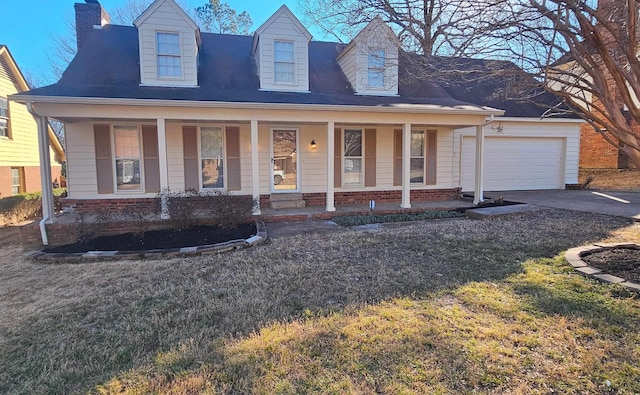 cape cod house with a porch, a garage, and a front lawn